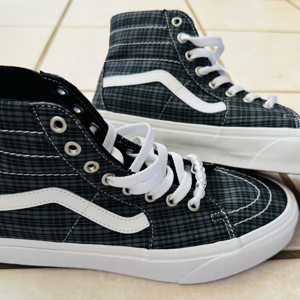 Vans Black and White High-Top Sneakers